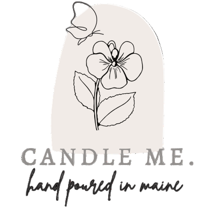 Candle with floral design and 'Candle Me. Hand poured in Maine' text on a white background